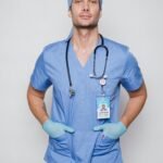 Serious doctor in uniform with stethoscope